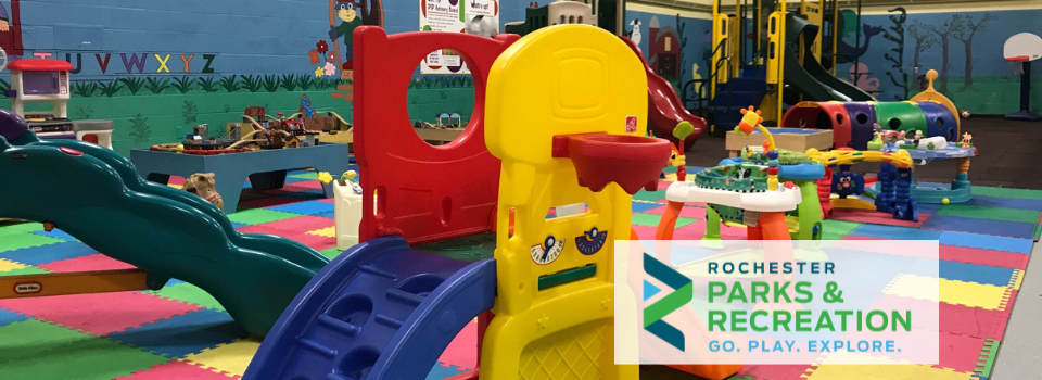 indoor playground with slides bounce stations and foam flooring